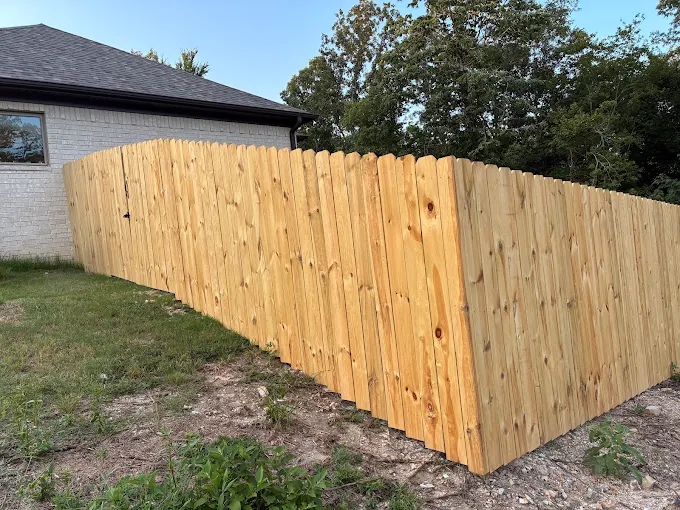 Delta Fence LLC team working on residential fence installation in Arkansas | Delta Fence LLC